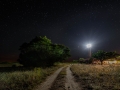 Lighthouse under the starry sky